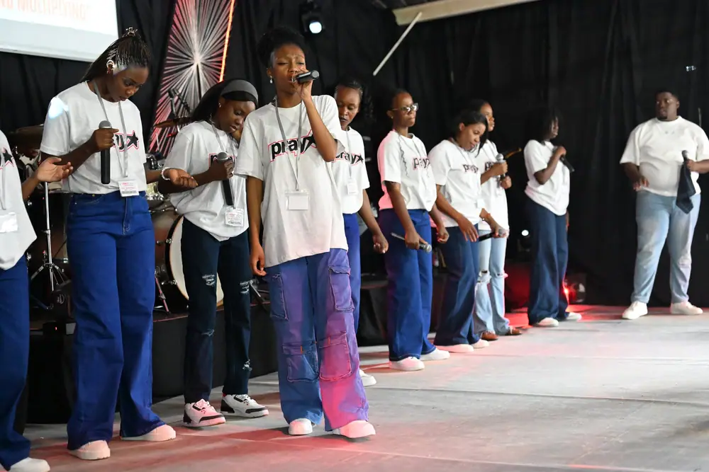 The youth group dancing in praise